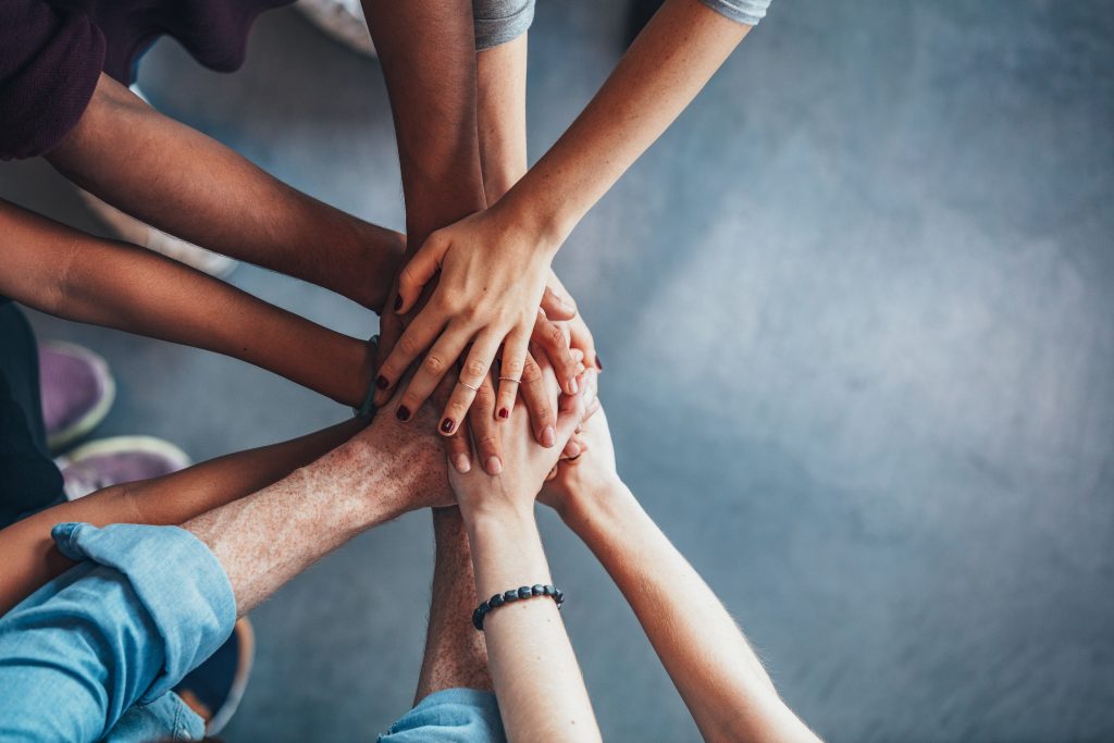 Multicultural People holding hands