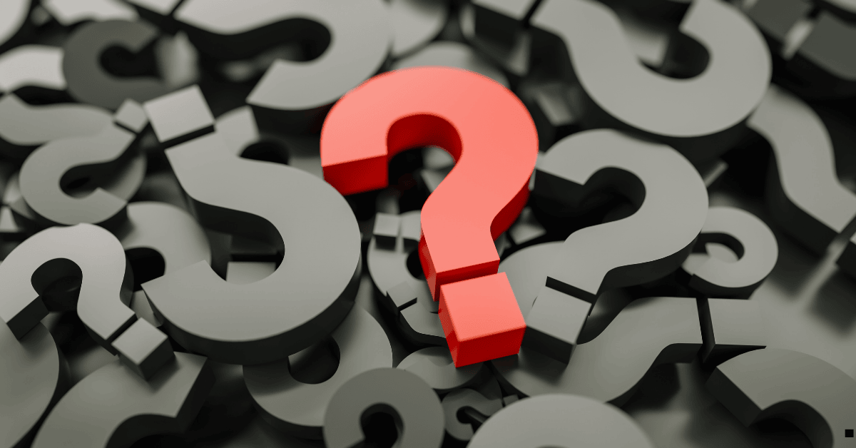 Questions marks scattered around with a red question mark