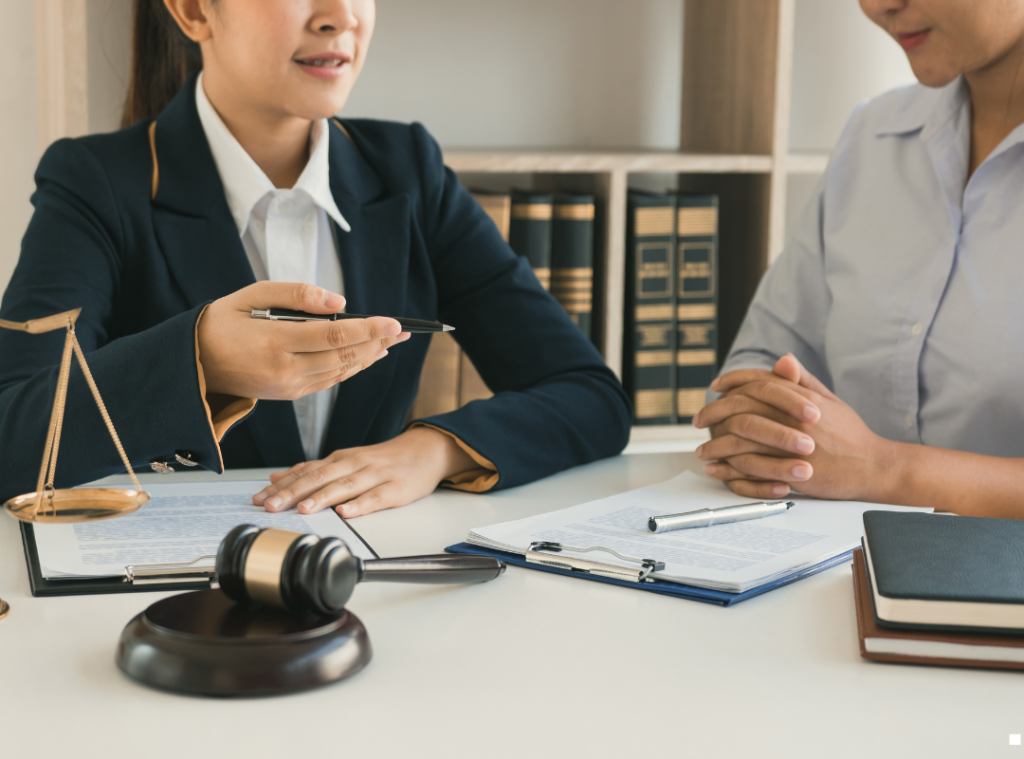 Legal assistance with a white woman speaking to a white male