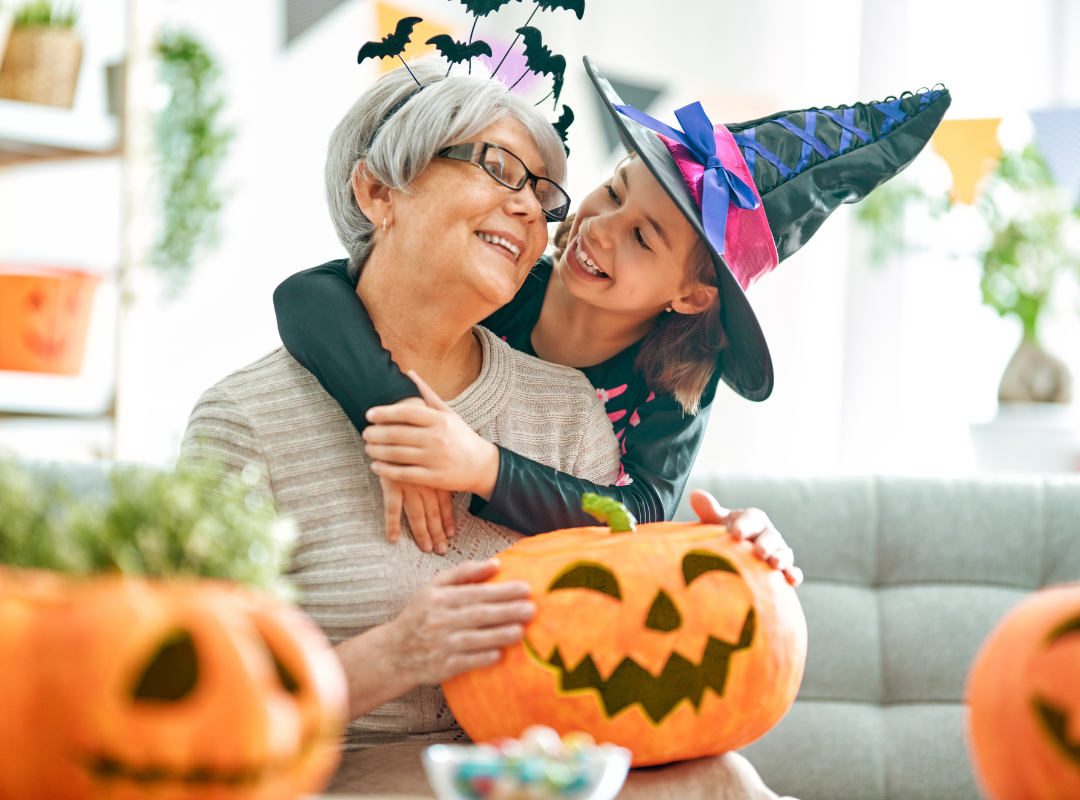 Mother and daughter at a Halloween pumpkin event