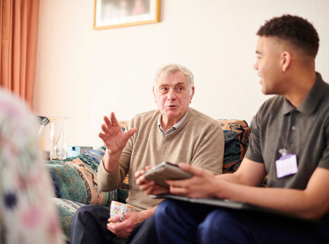 Accommodation manager talking to a resident