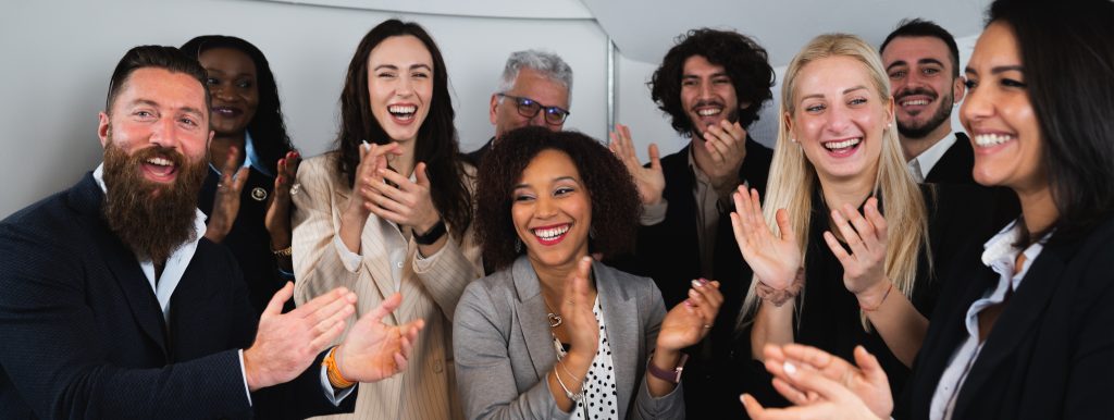Diverse ethnicity group of colleagues clapping hands congratulat